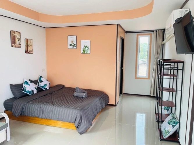 Standard Quadruple room with partial sea view