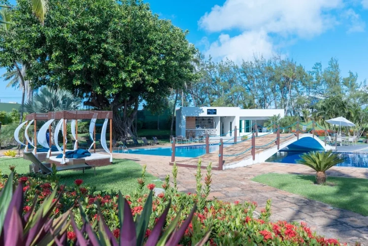Deluxe Triple room with balcony and with garden view