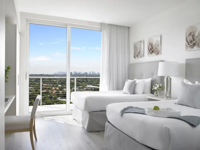 Quadruple Suite with balcony and with sunset view