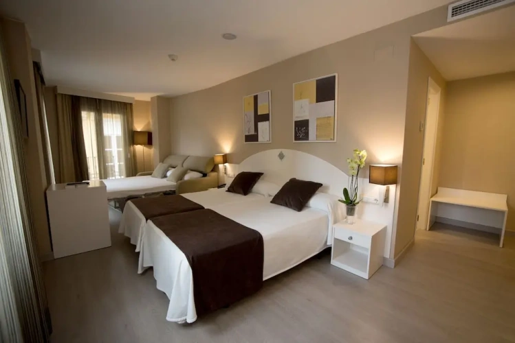 Standard Quadruple room with balcony