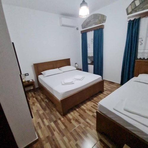 Standard Triple room with garden view
