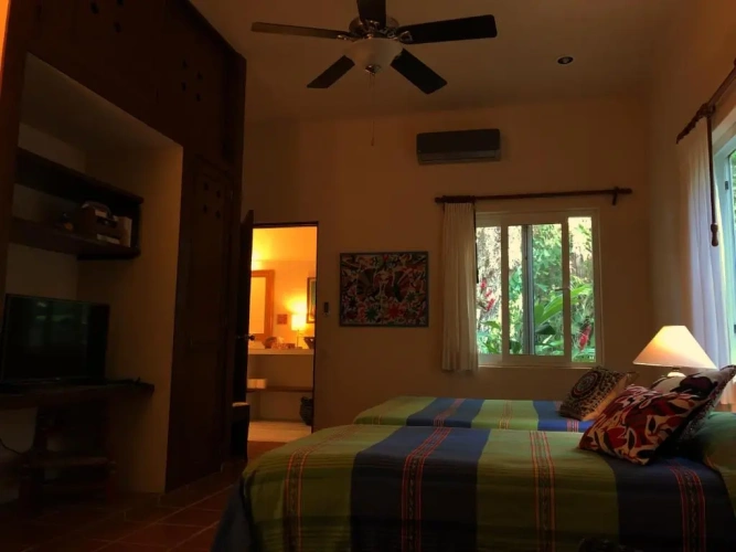Standard Triple room with garden view