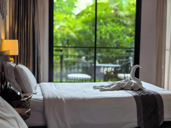 Standard Twin room with balcony and with garden view