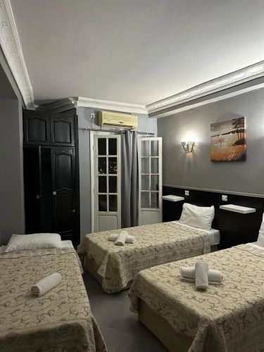 Standard Triple room with city view