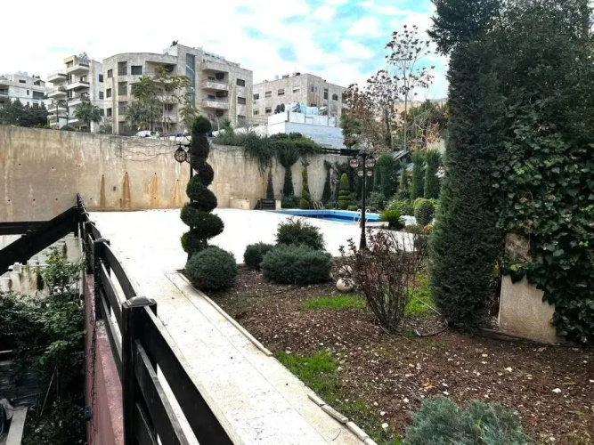 Spacious Amman flat with garden and Pool