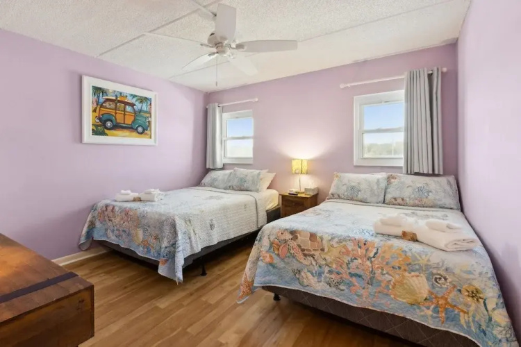 Oceanfront Beach Condo with Private Balcony, Short Walk to Pool and Beach by RedAwning