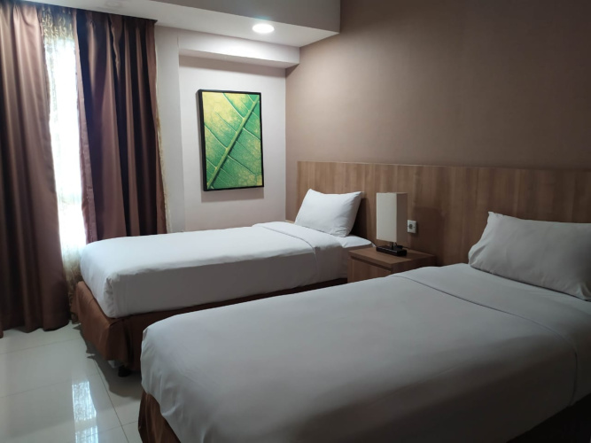 Grand Tropic Suites Hotel