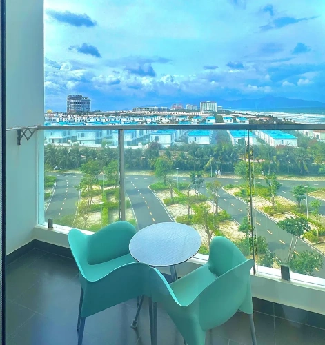 Deluxe Triple room with balcony and with partial ocean view