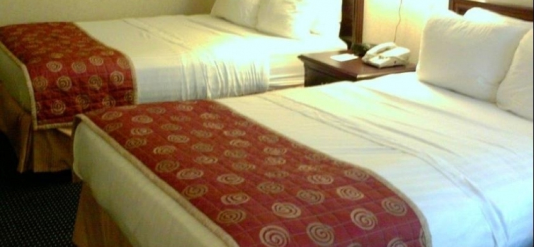 Merit Hotel & Suites