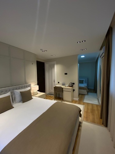Standard Triple room with garden view
