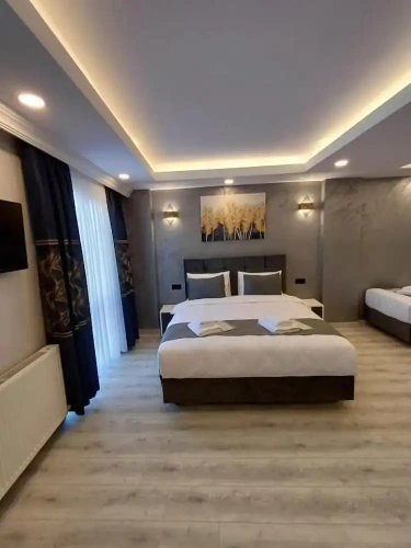 Deluxe Quadruple room with sea view