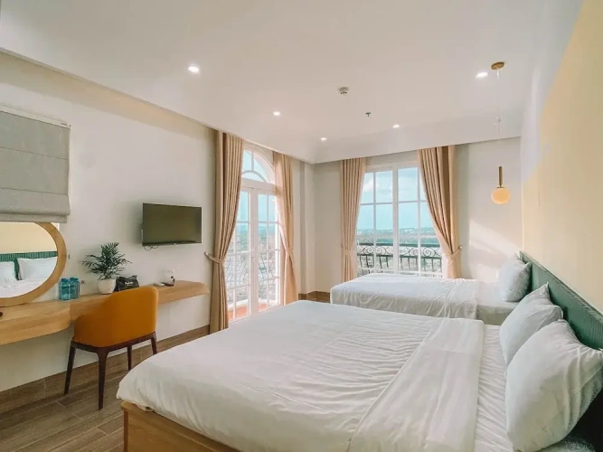 Premier Quadruple room with balcony and beachfront