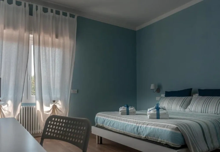 Standard Triple room with garden view