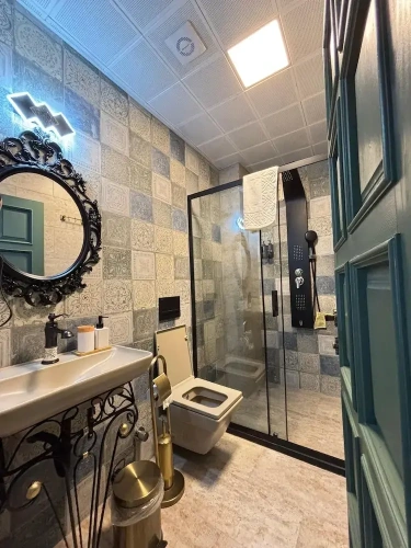 Deluxe Triple room with courtyard view
