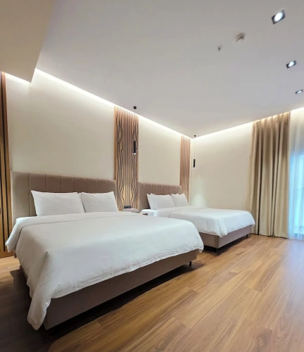Deluxe Quadruple room with balcony