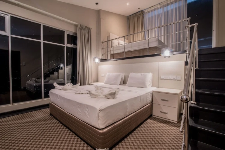 Standard Family Penthouse room with balcony and with city view