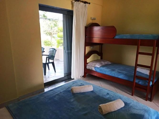 Standard Quadruple room with garden view
