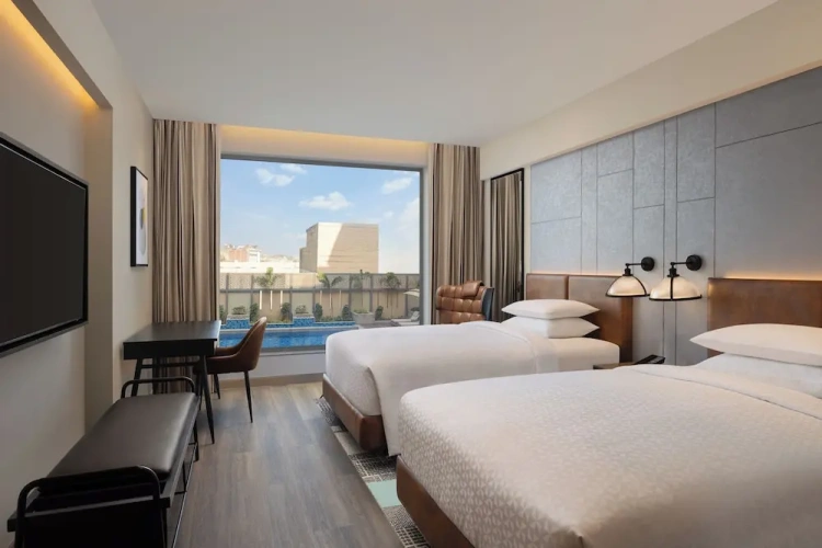 Deluxe Quadruple room with pool view