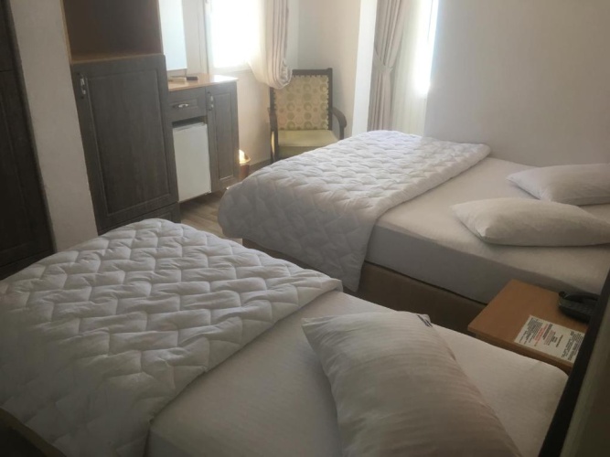Standard Triple room with sea view