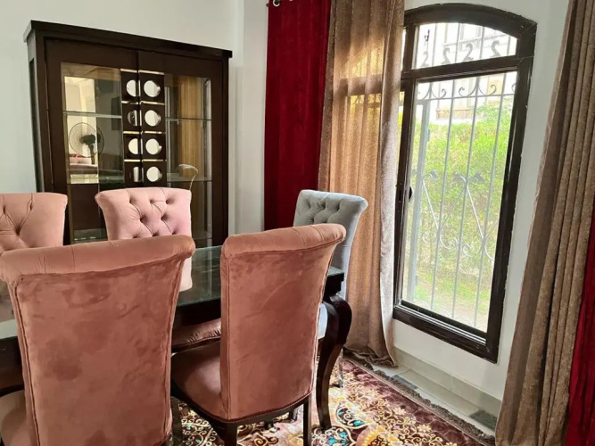 Comfortable apartment with a private garden near AUC شقه فندقيه