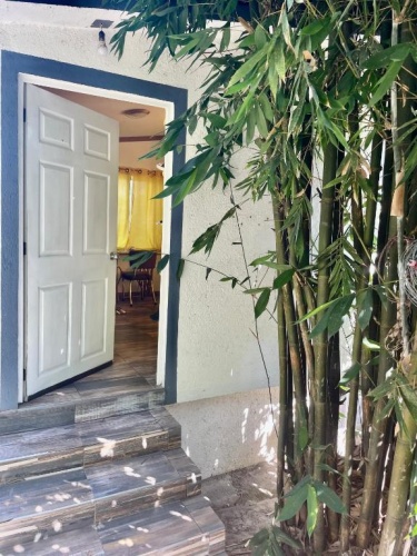 Standard Triple room with garden view