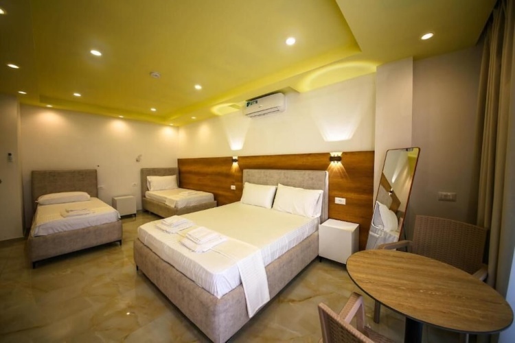 Standard Quadruple room with balcony and with sea view