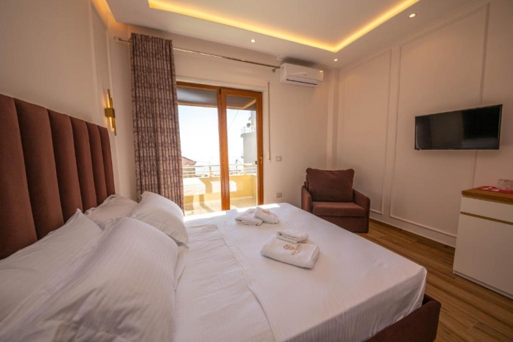 Standard Quadruple room with balcony and with sea view
