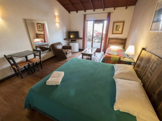Standard Triple room with partial view