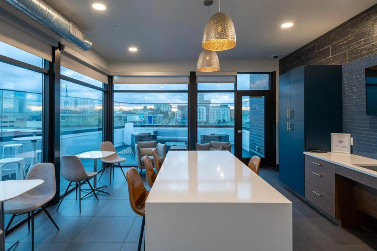 Flexhome Skywalk to Fiserv U5 RooftopGymParking