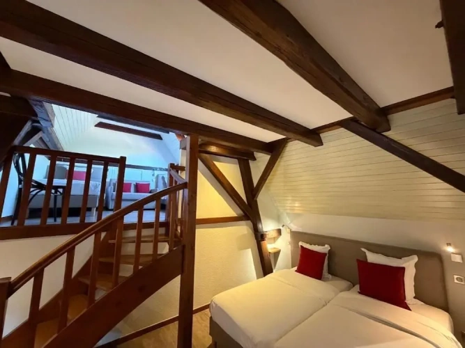 Standard Quadruple Family room with courtyard view