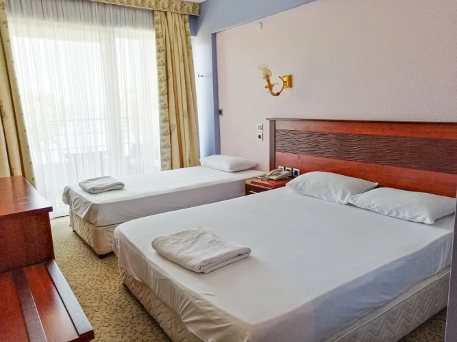 Standard Triple room with balcony and with lake view