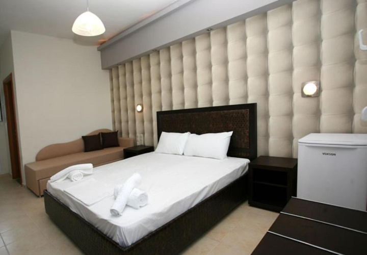 Standard Quadruple room with balcony and with garden view