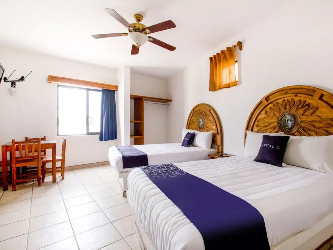 Capital O Hotel J y M