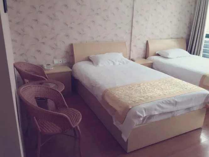 Wanhao Bussiness Hotel Siyang
