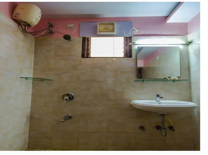 Oyo 5673 Maximum Holiday Inn Rooms