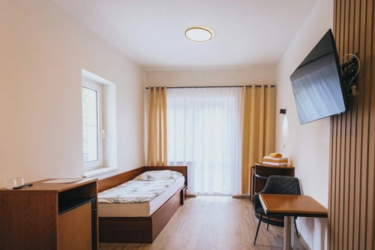 Standard Triple room with balcony and with garden view