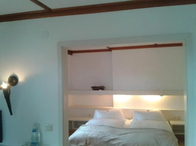 Standard Quadruple room with garden view