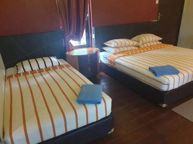 Deluxe Triple room with garden view