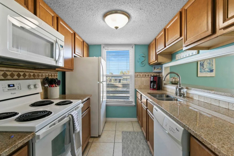 Spacious 2BR Condo With Pool Steps From the Beach