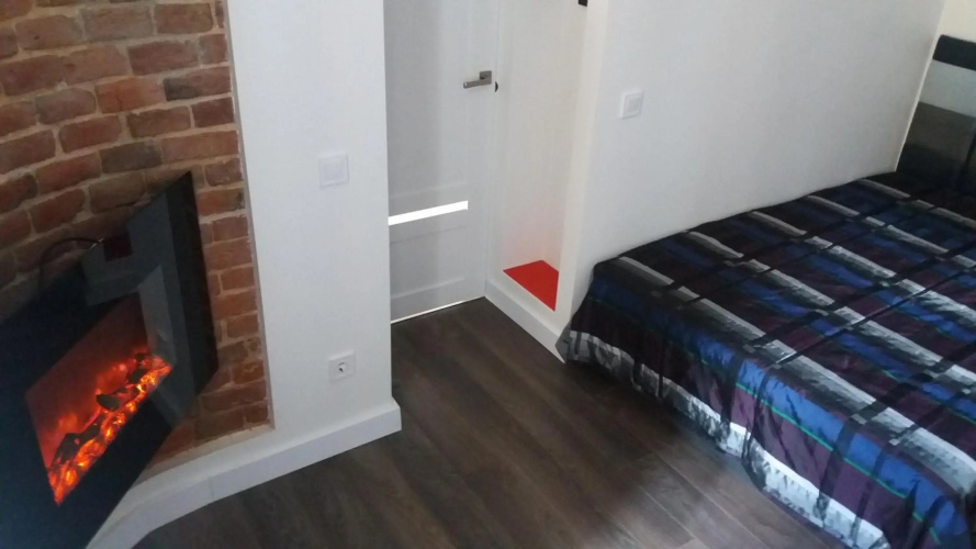 Apartment with fireplace