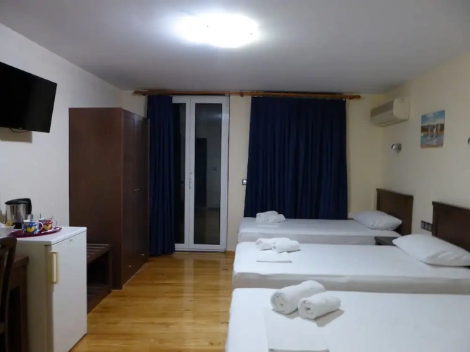 Standard Triple room with balcony and with city view