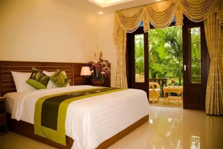 Deluxe Double room with balcony and with garden view