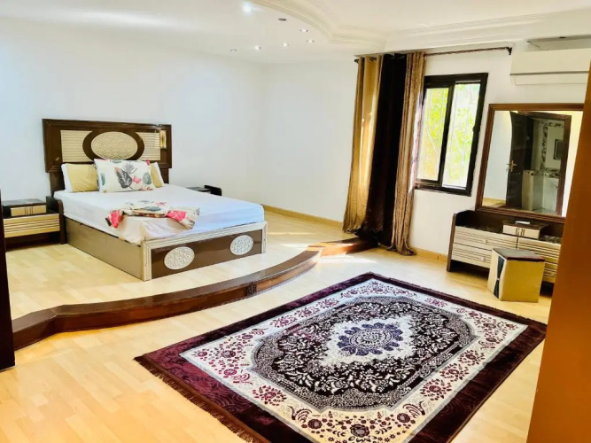 Comfortable apartment with a private garden near AUC شقه فندقيه