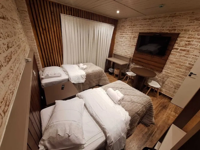 Deluxe Quadruple room with garden view