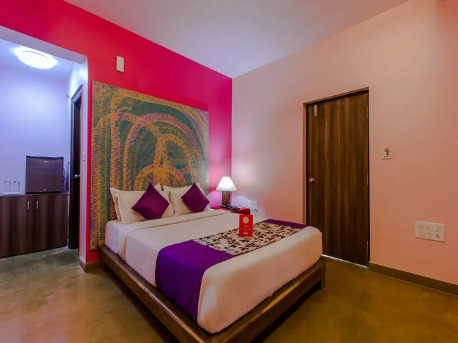Oyo 5673 Maximum Holiday Inn Rooms