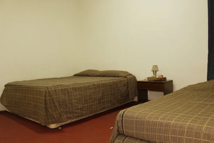 Standard Triple room with courtyard view