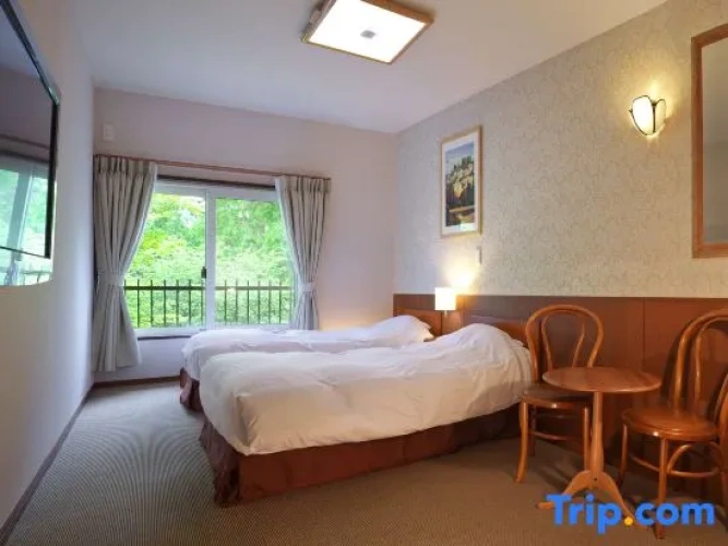 Standard Twin room with garden view