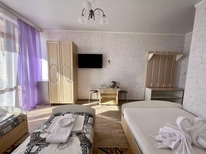 Standard Quadruple room with balcony