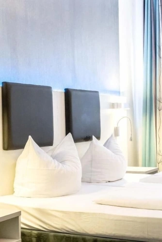 Standard Quadruple room with city view