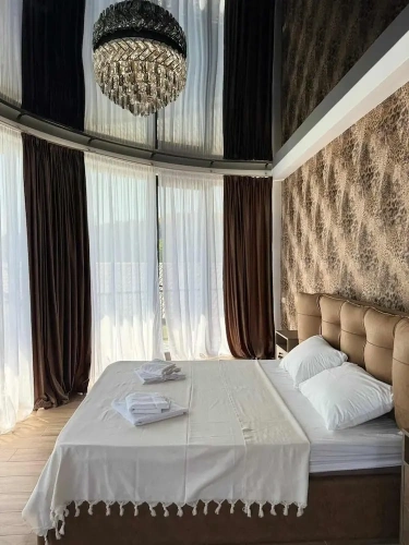 Deluxe Quadruple room with balcony
